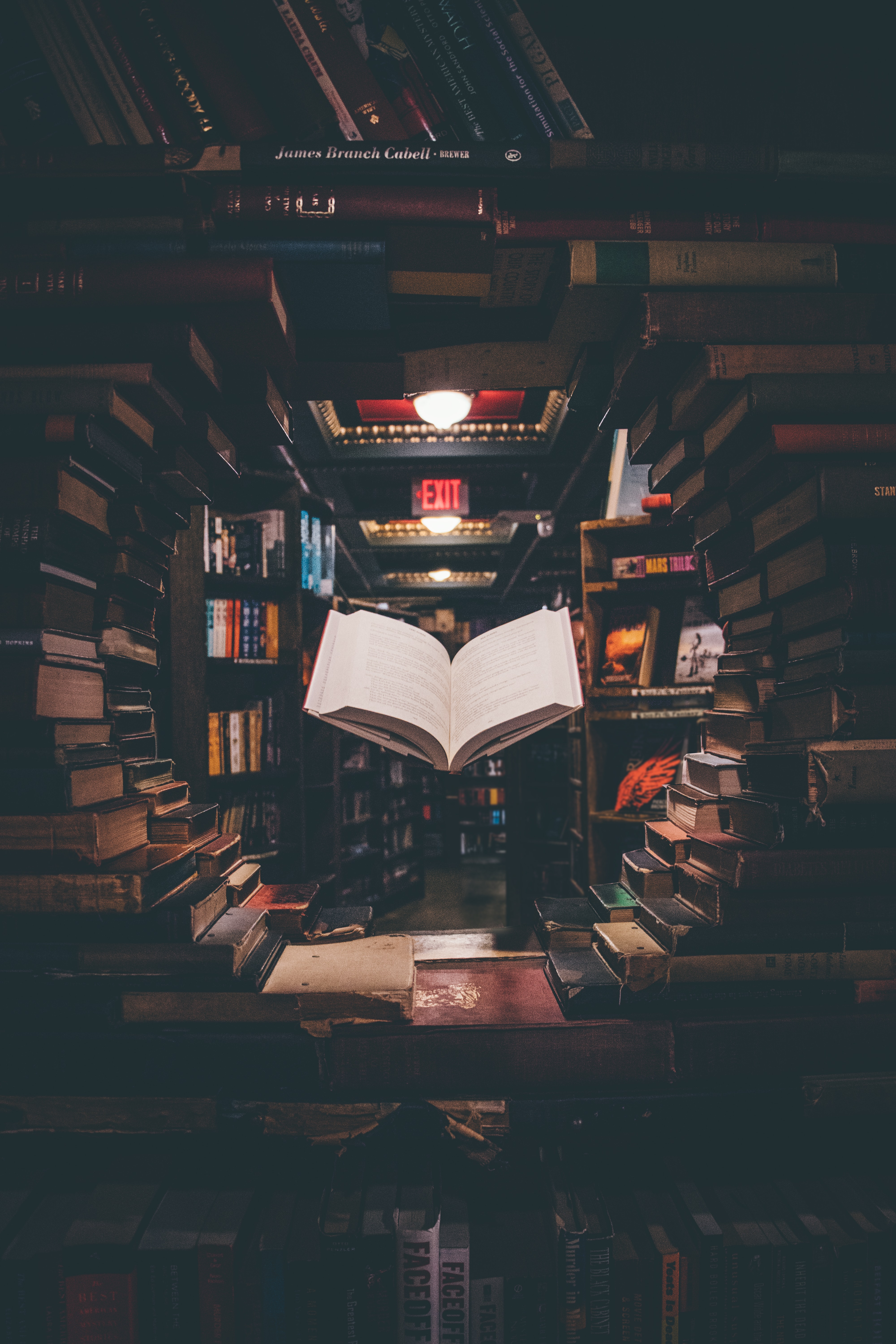 library with a floating book